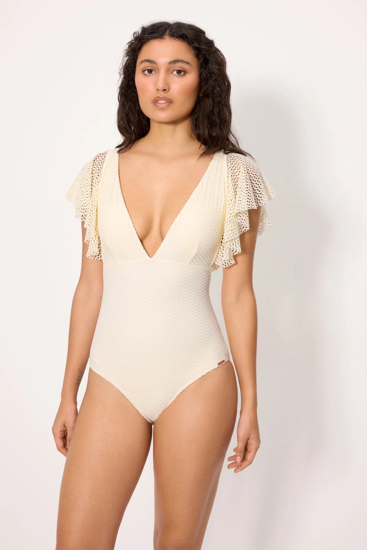 Costume da bagno marrone traforato con scollatura profonda
